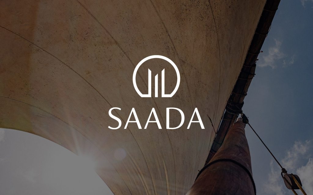 Saada. Brand logo in white