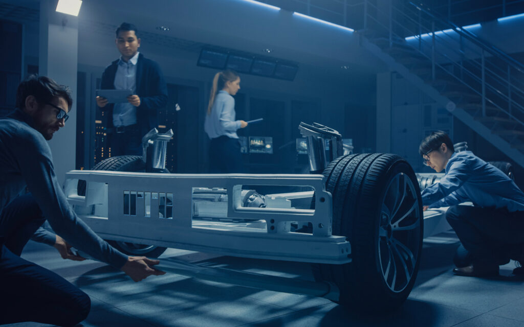 UTB. Image with team working on Car project