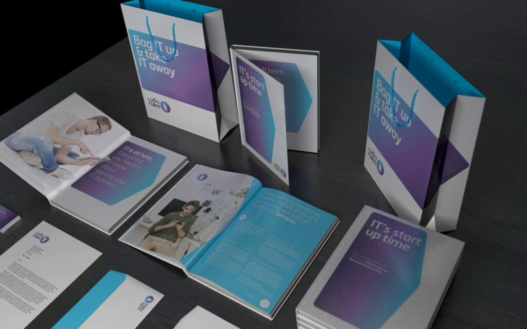 Rukn. Brochure spreads with branded paper bag