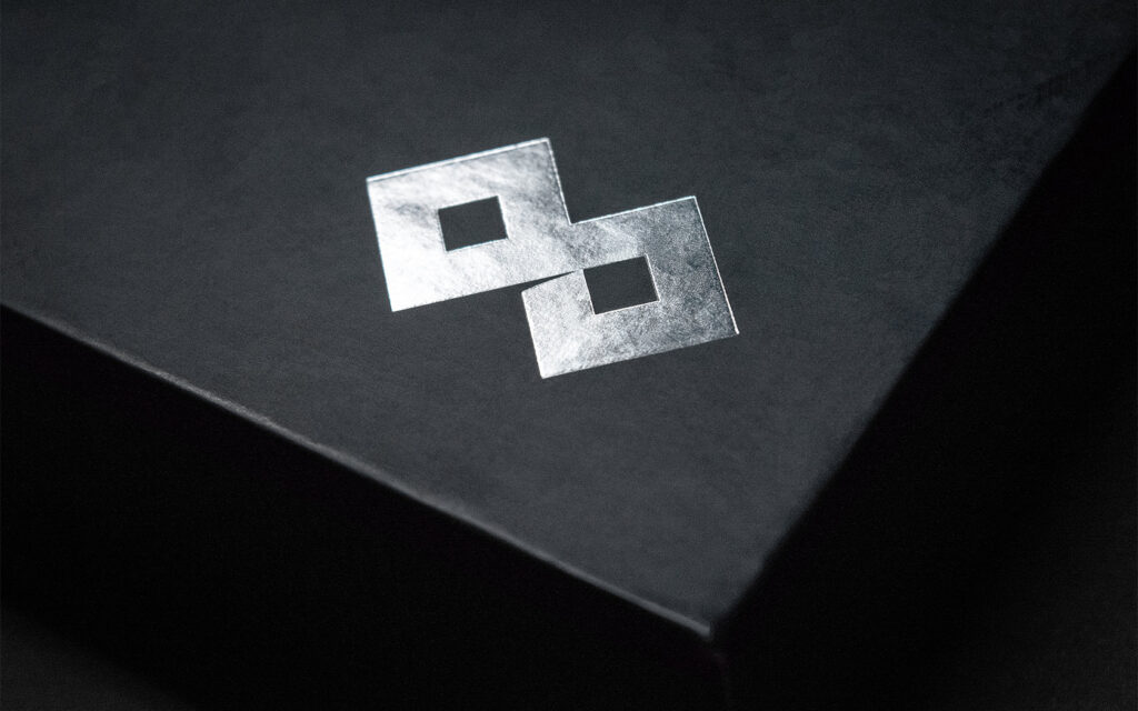 Silver foil on black paper for GFH Annual Report 2018