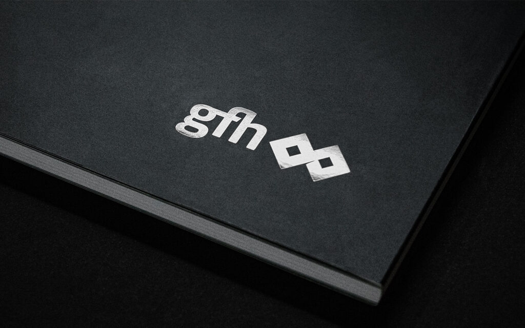 Silver foil on black cover for GFH Annual Report 2018