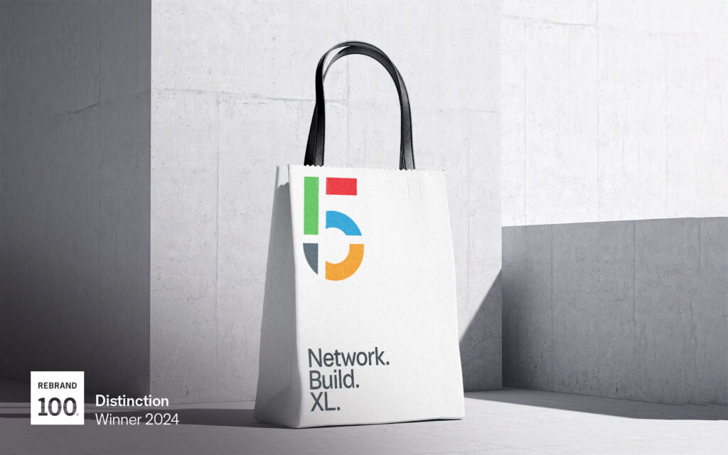 Branded bag with large icon and slogan at bottom for Big5.