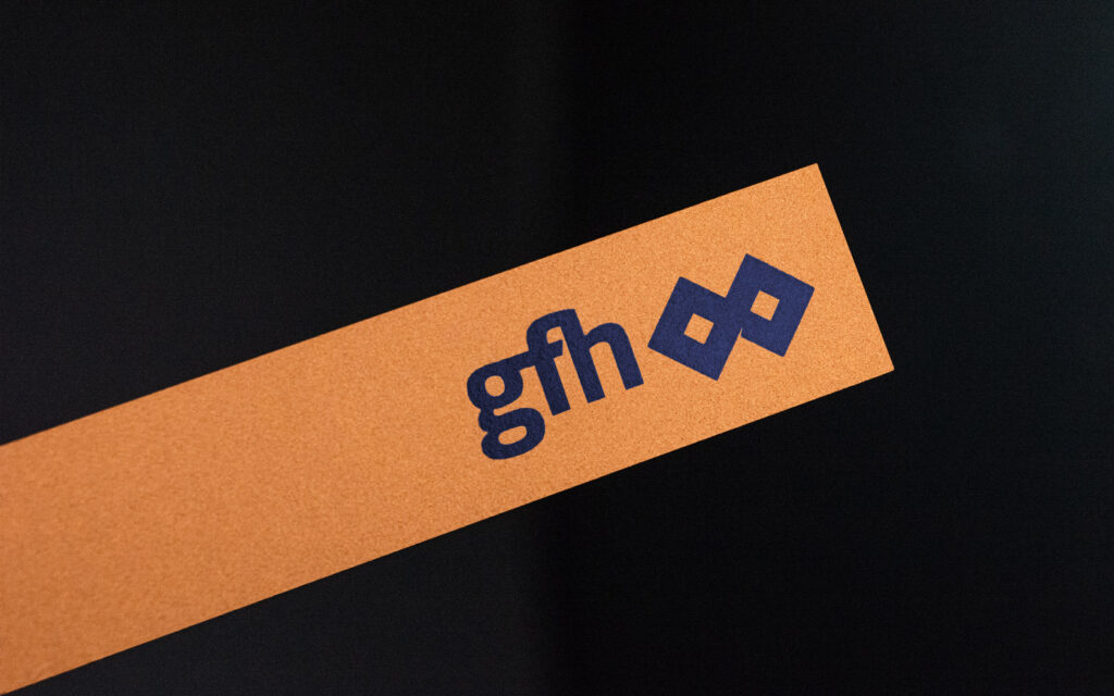 GFH band logo on copper finish acrylic base for GFH Calendar 2025