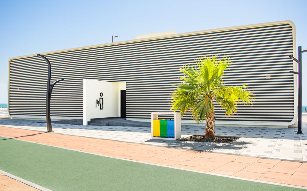Shower Room building with entrance sign for Sama Bay.
