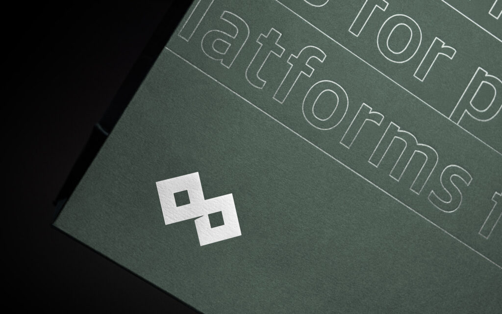 Annual Report Slipcase with transparent and Rose Silver foil treatment for GFH Annual Report 2025.