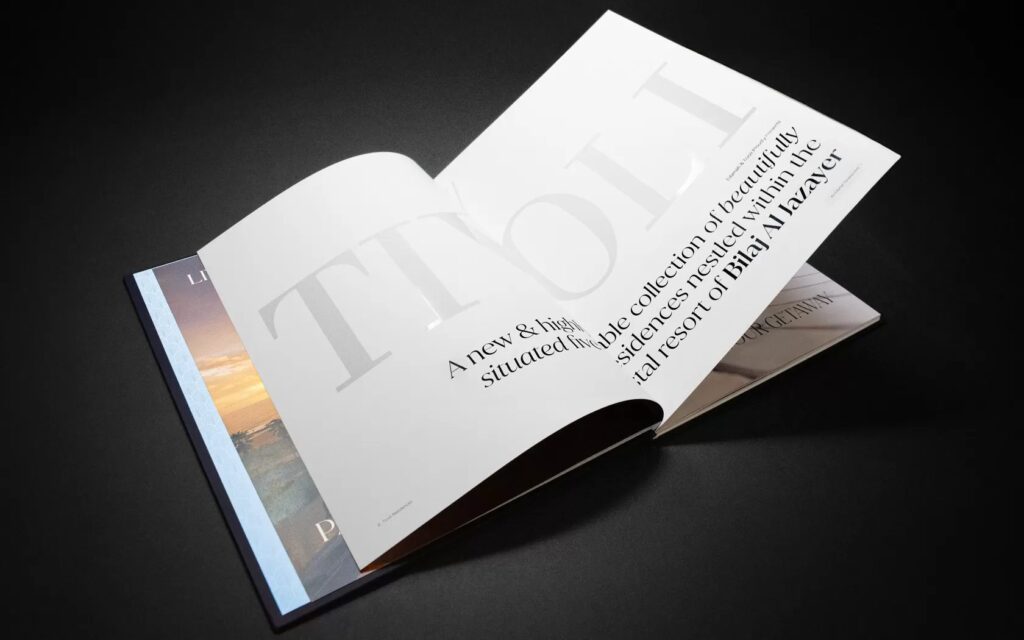 The Tivoli Residences brochure for Edamah, pairing elegant typography with calm, considered editorial layouts.