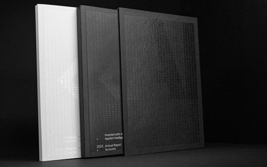 Annual report covers with tactile embossed finishes, turning the financial story into a crafted object.