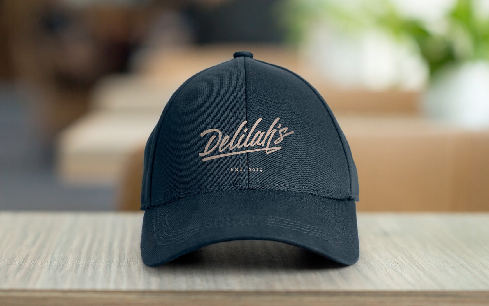 Delilah’s. Cap branding