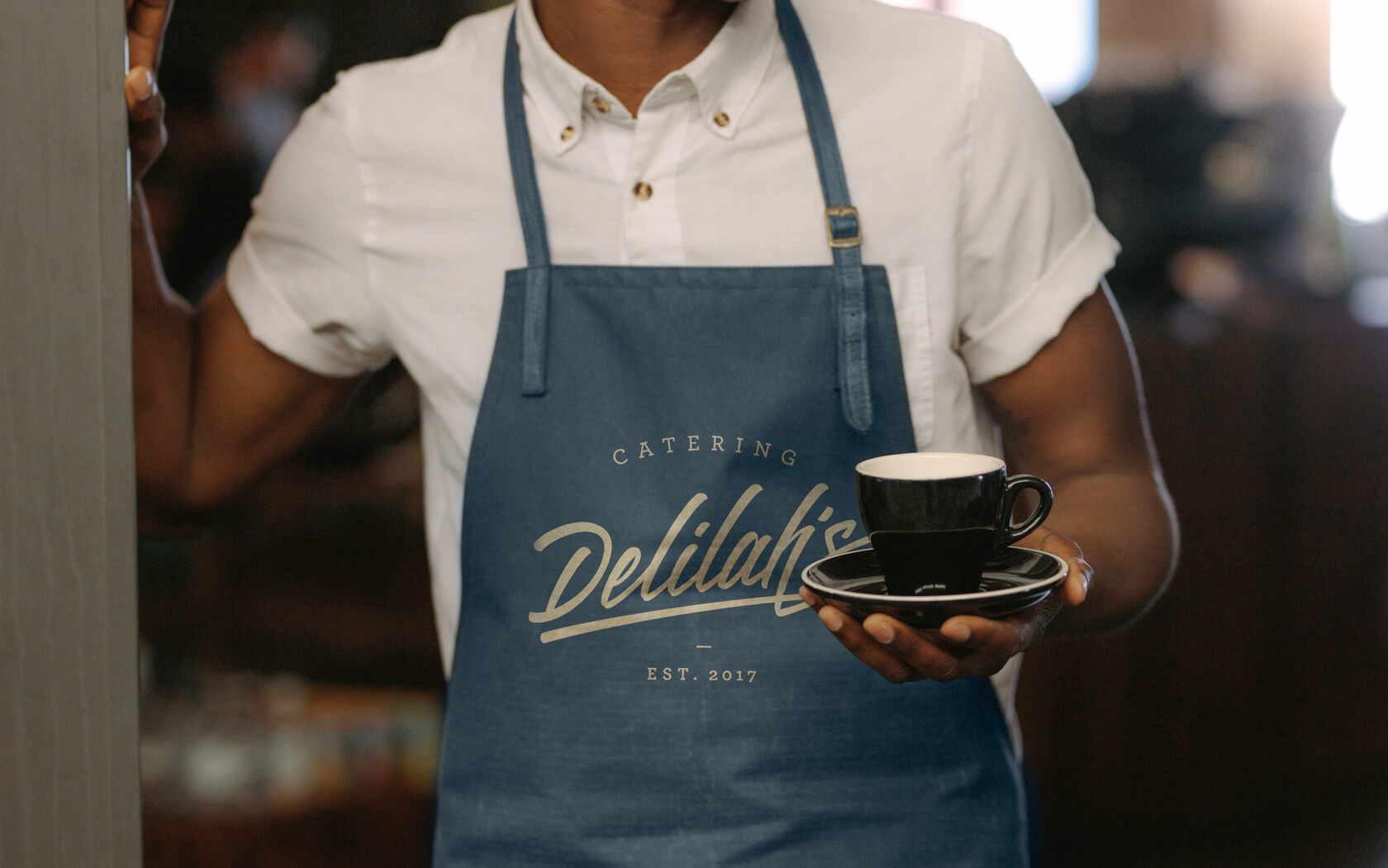 Delilah’s. Staff apron branding