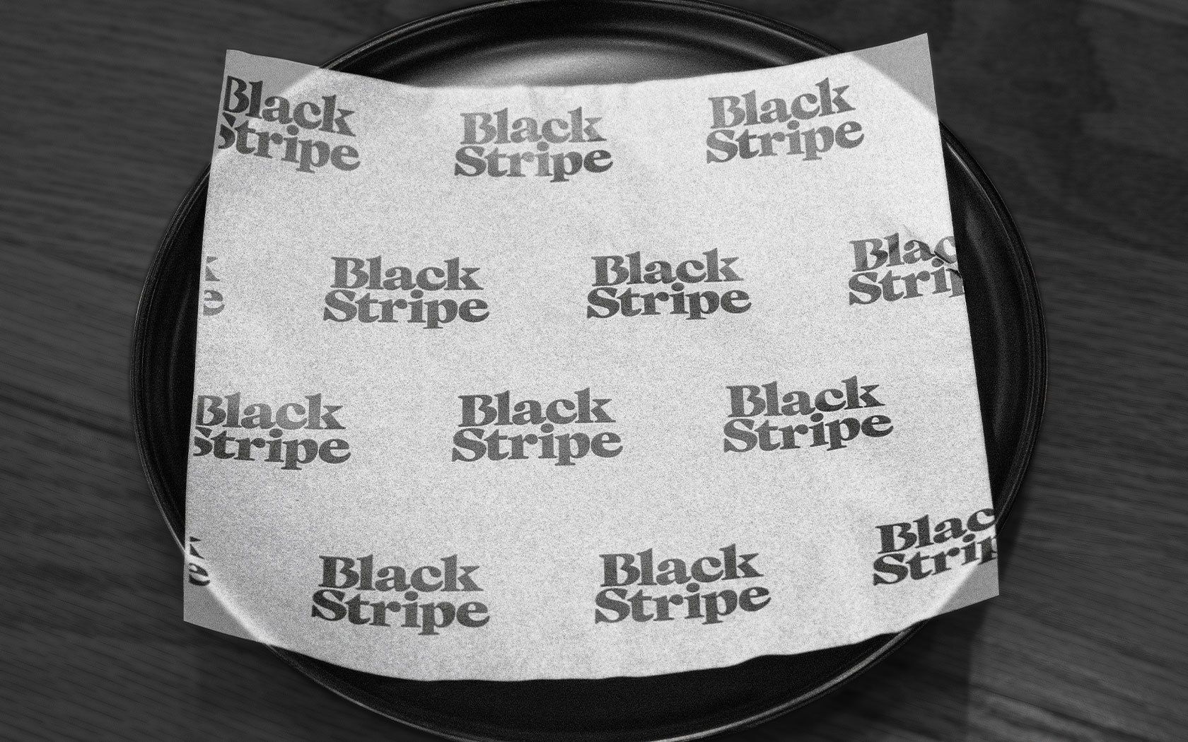 Black Stripe. Wrapping paper with brand logo
