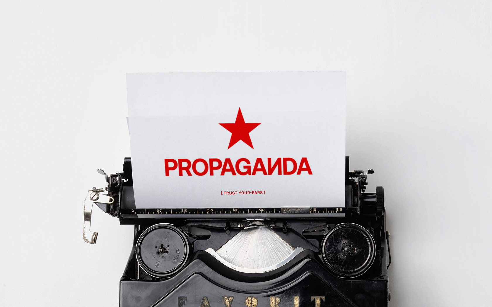 Propaganda. Brand logo in red