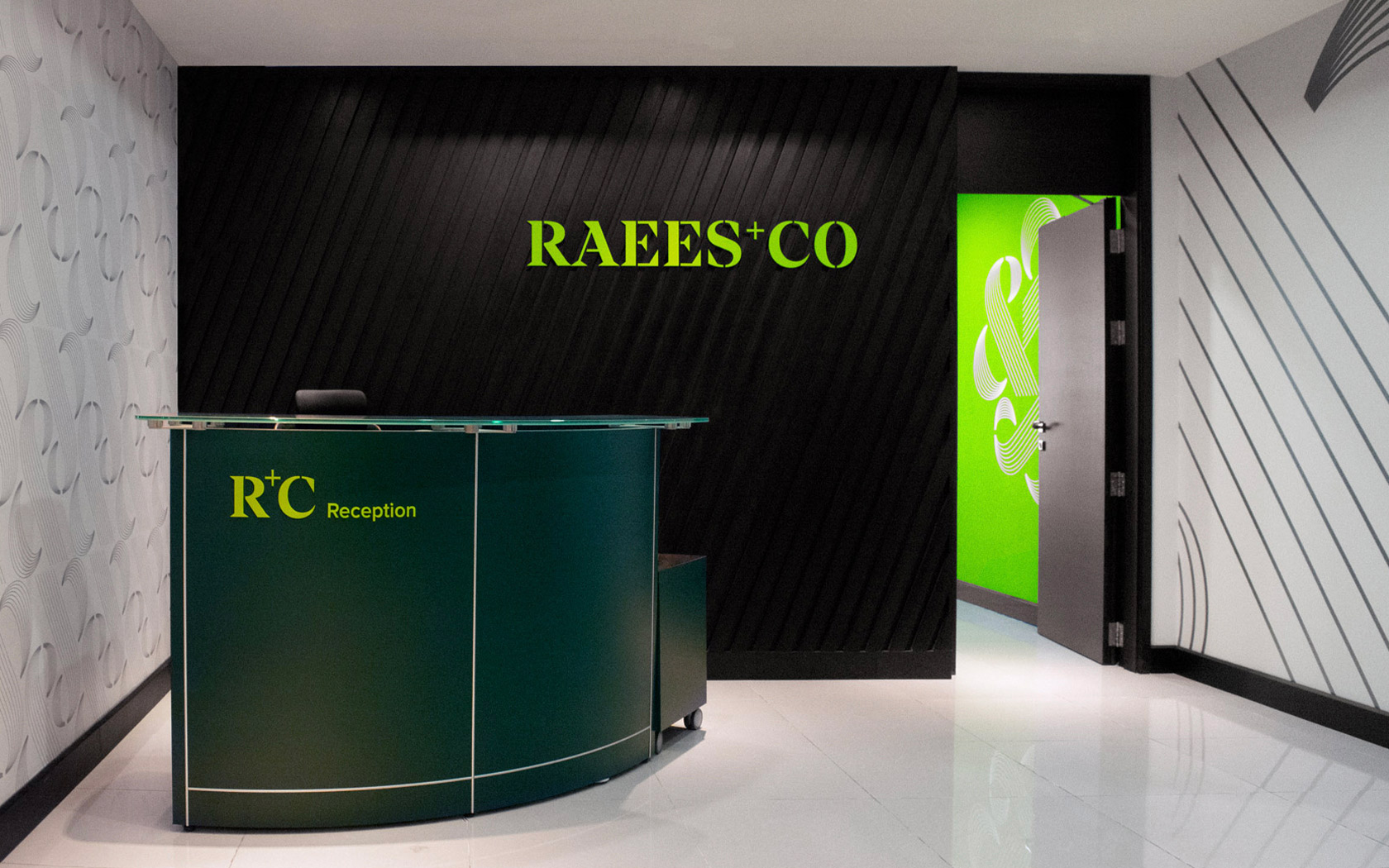 Raees & Co. Reception area branding