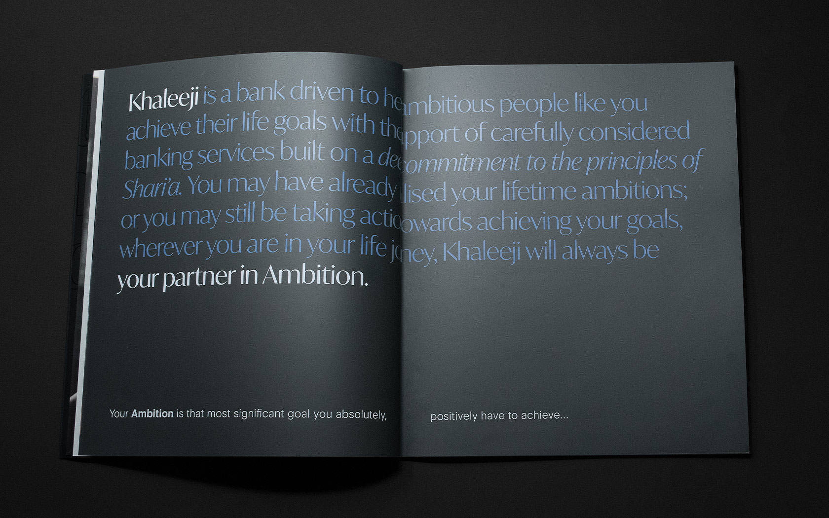 Khaleeji Brand Book. Black spread with text