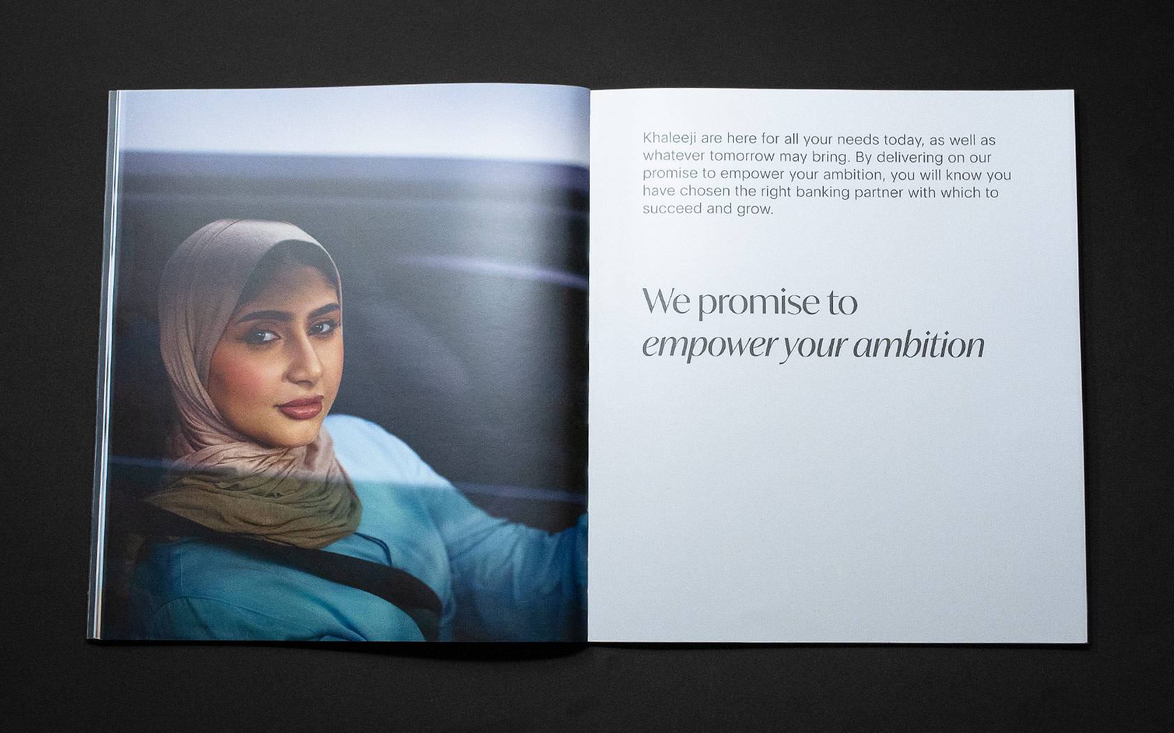 Khaleeji Brand Book. Lady in a car image with headline and body copy