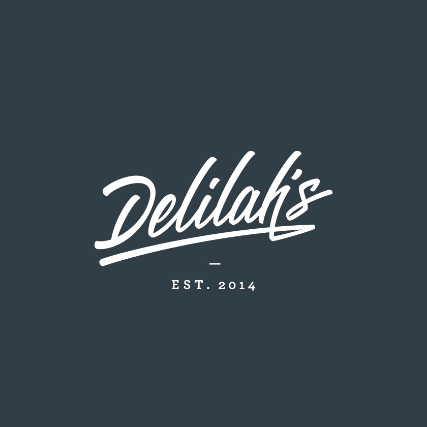 Delilah’s. Brand logo in white