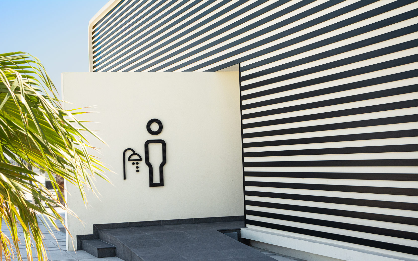 Shower Room Entrance sign for Sama Bay.