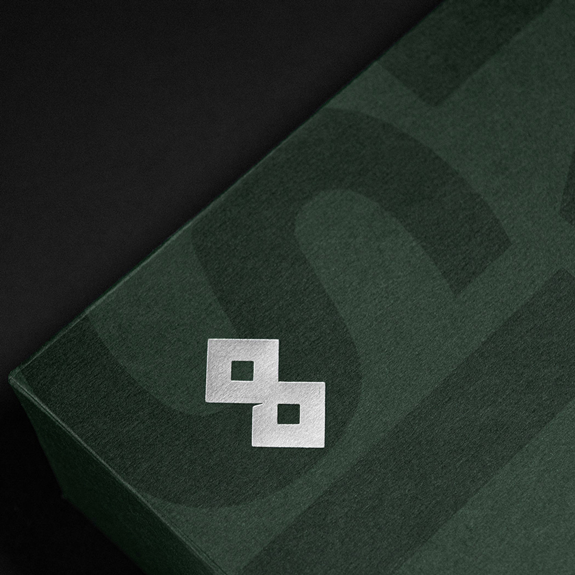 Logo detail Silver foiled and printing treatment into premium paper cover. 2026 Calendar By Unisono for GFH Financial Group.