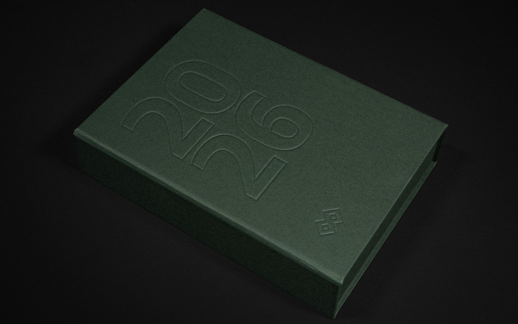 Box with pillow embossed treatment into premium paper cover. 2026 Calendar By Unisono for GFH Financial Group.