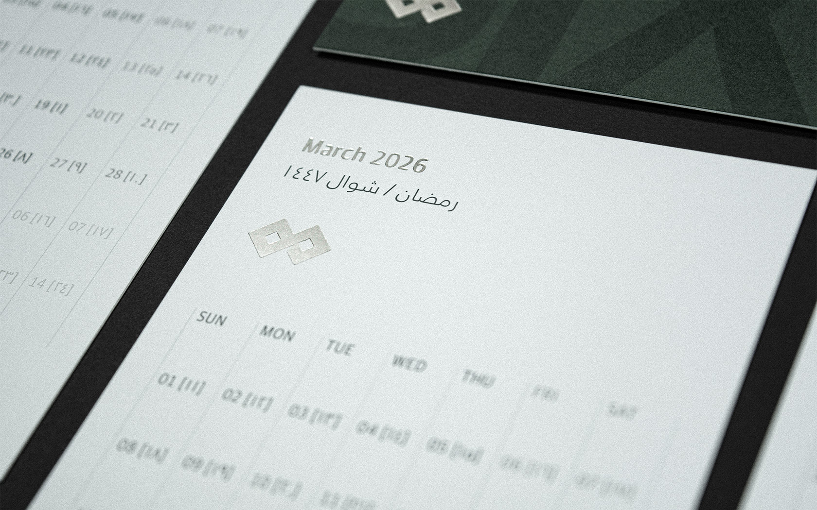 Calendar sheets with Silver foiled treatment. 2026 Calendar By Unisono for GFH Financial Group.