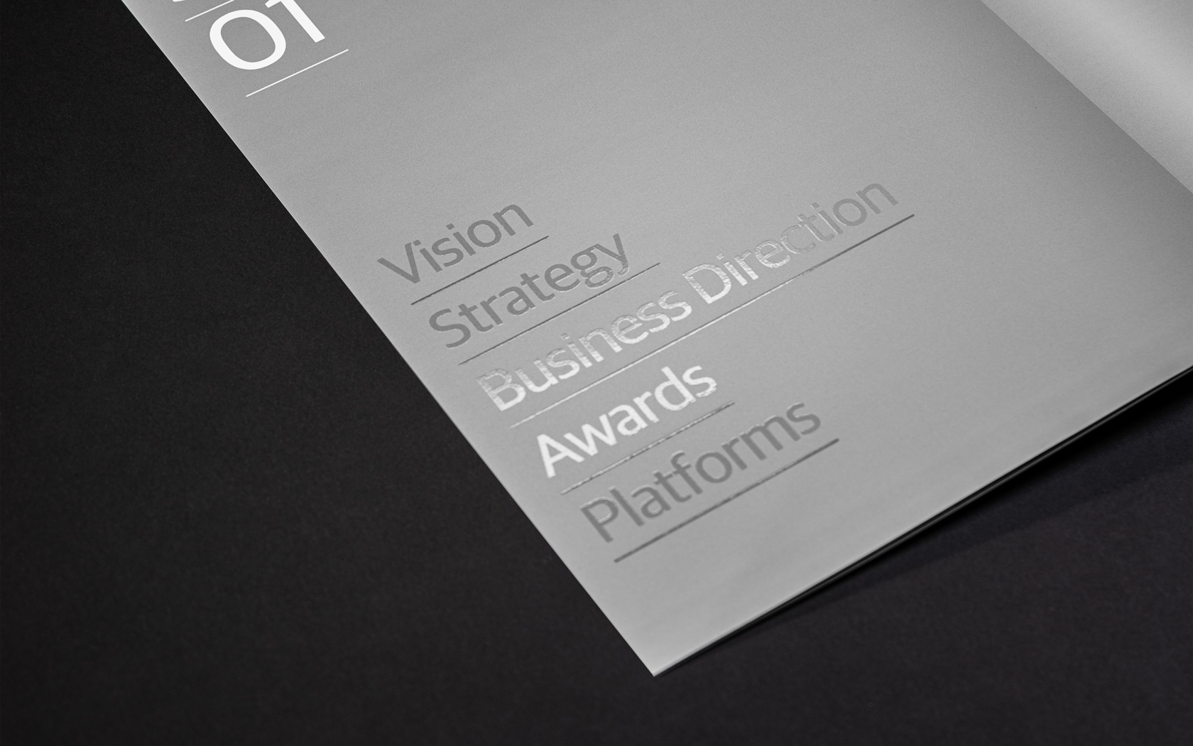 Annual Report inside spread with special UV print treatment for GFH Annual Report 2025.