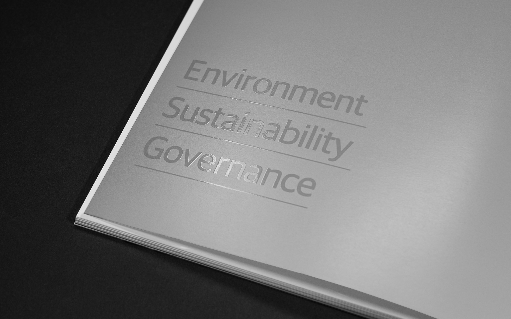 Annual Report inside spread with special UV print treatment for GFH Annual Report 2025.