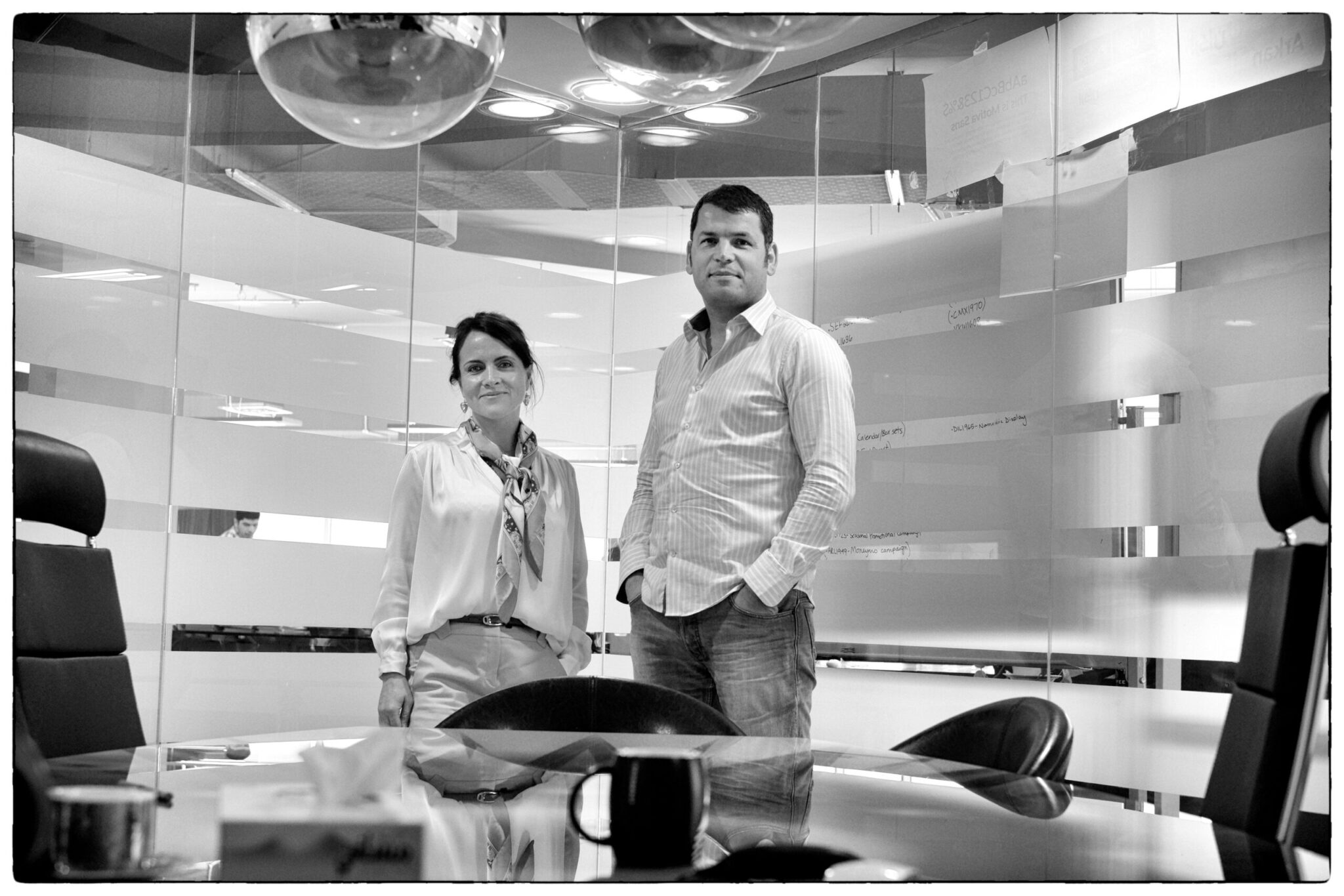 Amy Morgan and Liam Farrell in the conference room at Unisono’s Exhibition Tower studio